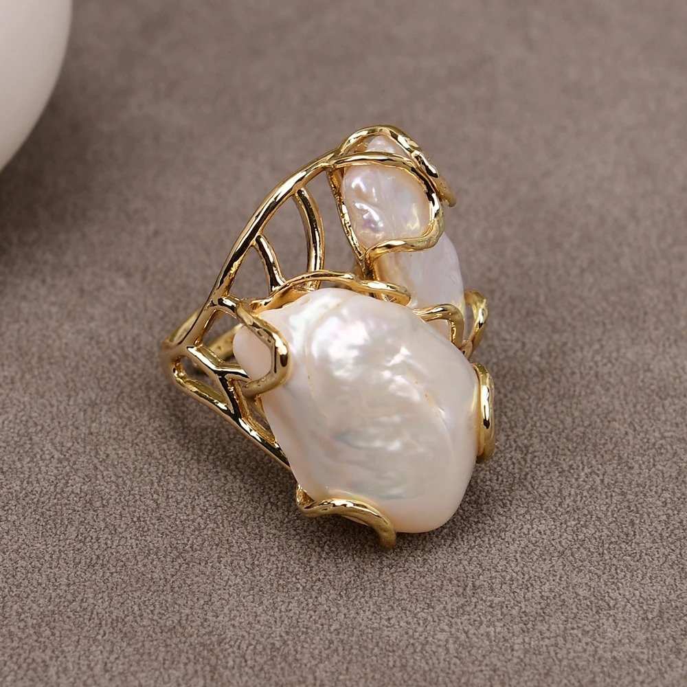 bague or perle de culture bien présenter