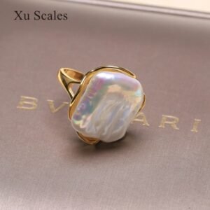 bague or perle de culture blanche