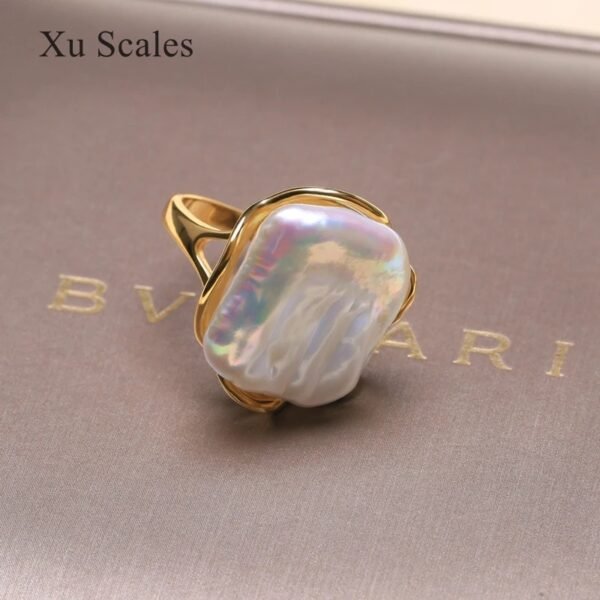 bague or perle de culture blanche